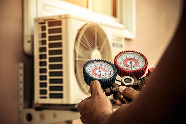 Professional Heat Pump Repair technician working in East Concord, NY